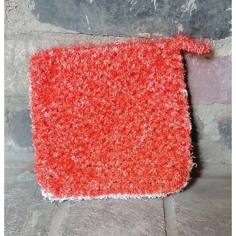 Sea foam green and coral shower scrubby